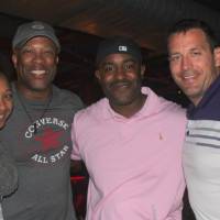 3 men one woman smile